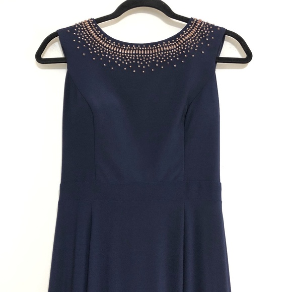 Xscape Beaded Ruffle Back Jersey Trumpet Gown - Picture 6 of 10